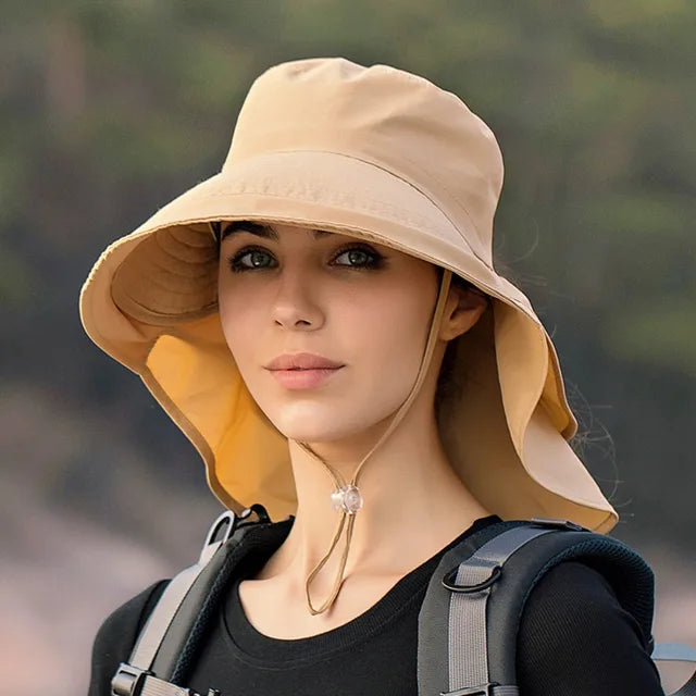 Women's breathable sun hat designed for fishing, hiking, and outdoor activities, featuring a wide brim for sun protection and lightweight fabric for comfort. 3