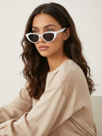 Women's cat eye sunglasses in a retro style, perfect for sunny days and travel, featuring a stylish frame and UV protection. 7