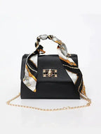 Elegant women's classic leather handbag designed for everyday use, featuring a compact design that combines style and functionality. 0