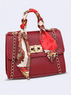 Elegant women's classic leather handbag designed for everyday use, featuring a compact design that combines style and functionality. 1