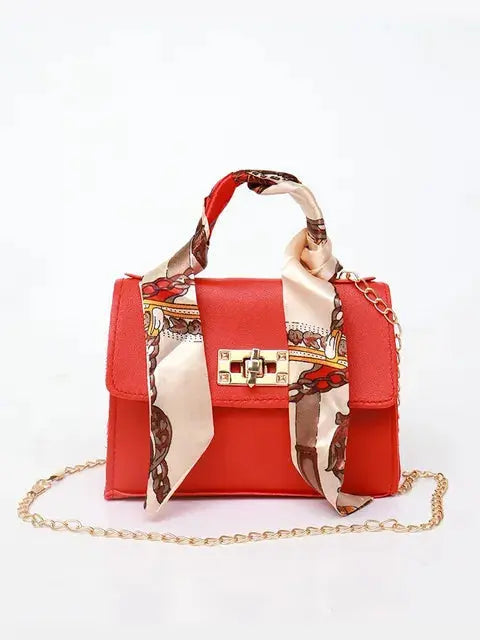 Elegant women's classic leather handbag designed for everyday use, featuring a compact design that combines style and functionality. 3