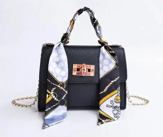 Elegant women's classic leather handbag designed for everyday use, featuring a compact design that combines style and functionality. 6
