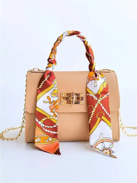 Elegant women's classic leather handbag designed for everyday use, featuring a compact design that combines style and functionality. 8