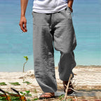 Women's classic linen trousers in a versatile design, ideal for casual wear, featuring a comfortable fit and breathable fabric for all-day comfort and style. 3