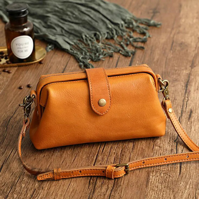 Women's compact adjustable crossbody bag featuring a stylish magnetic flap closure, perfect for hands-free convenience and organized storage. 7