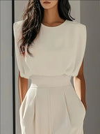 Women's elegant wide leg jumpsuit in a sophisticated design, perfect for formal occasions, featuring a flattering silhouette and stylish details. 1
