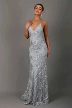 Elegant women's figure-hugging evening gown designed for gala events, featuring a flattering silhouette, intricate detailing, and a sophisticated color palette. 2