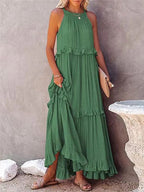 Elegant women's flowing maxi dress perfect for summer occasions, featuring a lightweight fabric, vibrant floral patterns, and a flattering silhouette that enhances comfort and style. 0