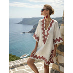 Women's flowy kaftan dress in a vibrant summer print, perfect for beach outings and casual gatherings. 3