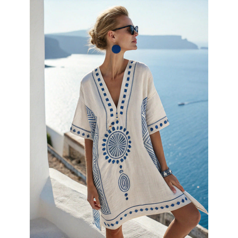 Women's flowy kaftan dress in a vibrant summer print, perfect for beach outings and casual gatherings. 6