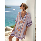Women's flowy kaftan dress in a vibrant summer print, perfect for beach outings and casual gatherings. 9