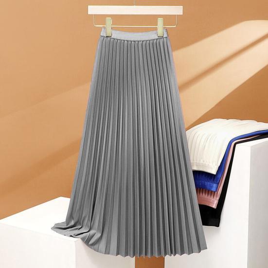 Women's high-waisted pleated maxi skirt in elegant fabric, perfect for casual and formal occasions, showcasing a flowy silhouette and versatile styling options. 0