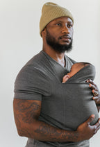 Women's kangaroo pocket baby carrier shirt designed for parenting activities, featuring a comfortable and stylish design, perfect for hands-free baby carrying and nurturing. 3