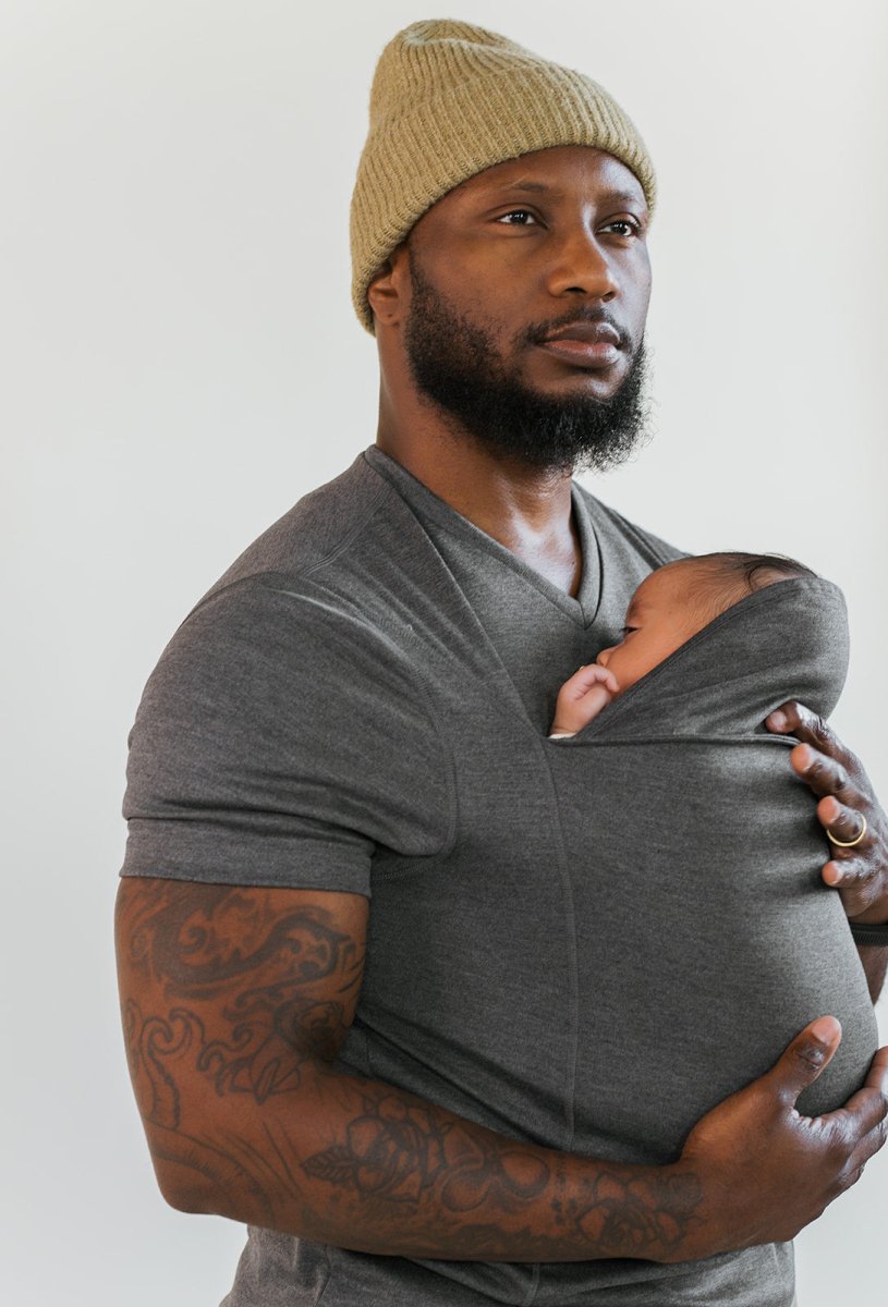 Women's kangaroo pocket baby carrier shirt designed for parenting activities, featuring a comfortable and stylish design, perfect for hands-free baby carrying and nurturing. 3