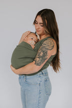 Women's kangaroo pocket baby carrier shirt designed for parenting activities, featuring a comfortable and stylish design, perfect for hands-free baby carrying and nurturing. 4