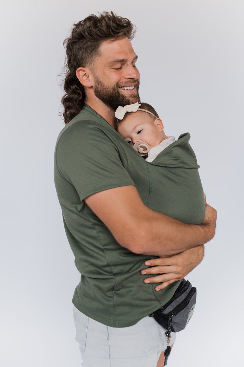 Women's kangaroo pocket baby carrier shirt designed for parenting activities, featuring a comfortable and stylish design, perfect for hands-free baby carrying and nurturing. 5
