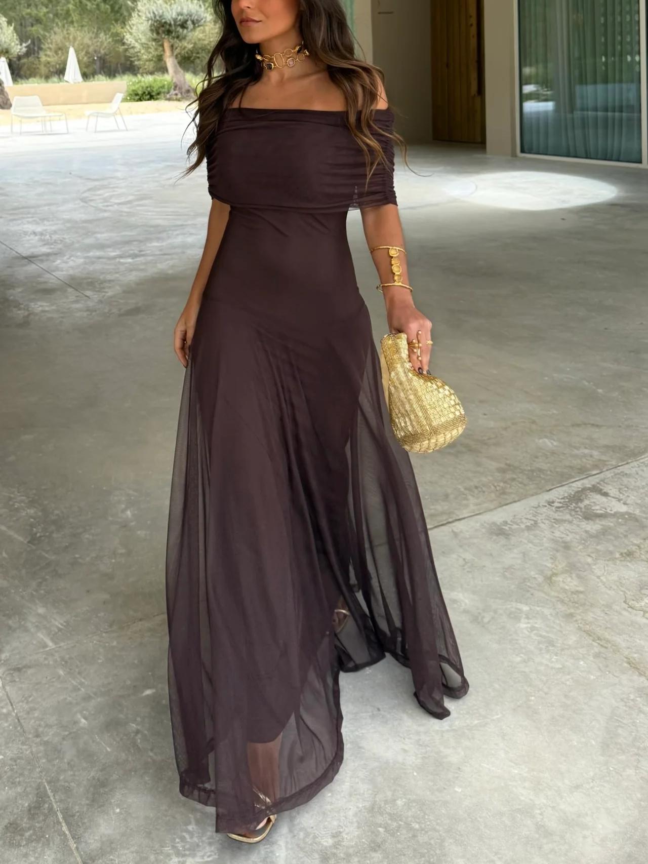 Elegant women's long flowing formal dress featuring a delicate mesh overlay, perfect for weddings and special occasions. 0