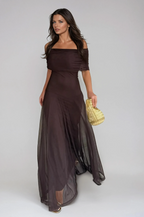 Elegant women's long flowing formal dress featuring a delicate mesh overlay, perfect for weddings and special occasions. 1