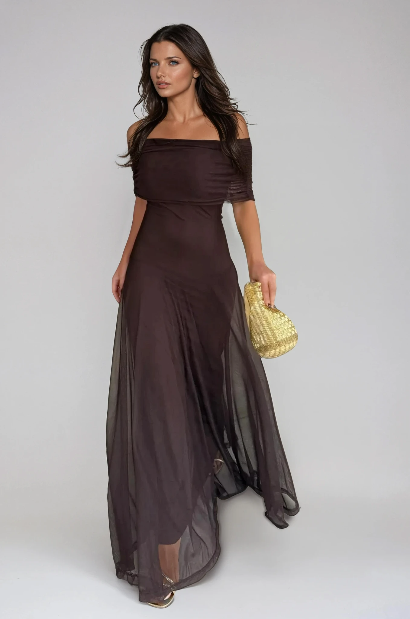 Elegant women's long flowing formal dress featuring a delicate mesh overlay, perfect for weddings and special occasions. 1