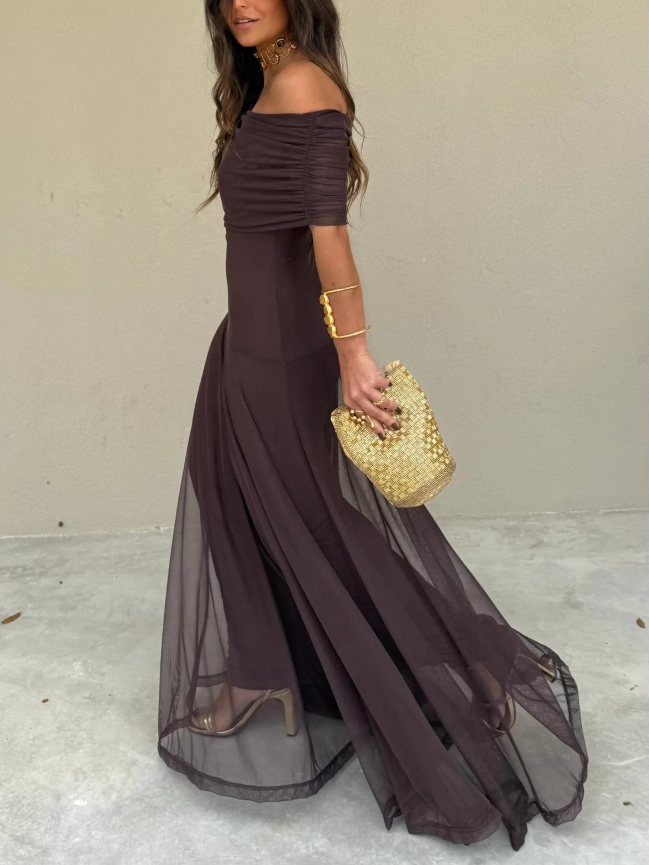 Elegant women's long flowing formal dress featuring a delicate mesh overlay, perfect for weddings and special occasions. 3