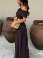 Elegant women's long flowing formal dress featuring a delicate mesh overlay, perfect for weddings and special occasions. 4