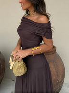Elegant women's long flowing formal dress featuring a delicate mesh overlay, perfect for weddings and special occasions. 7
