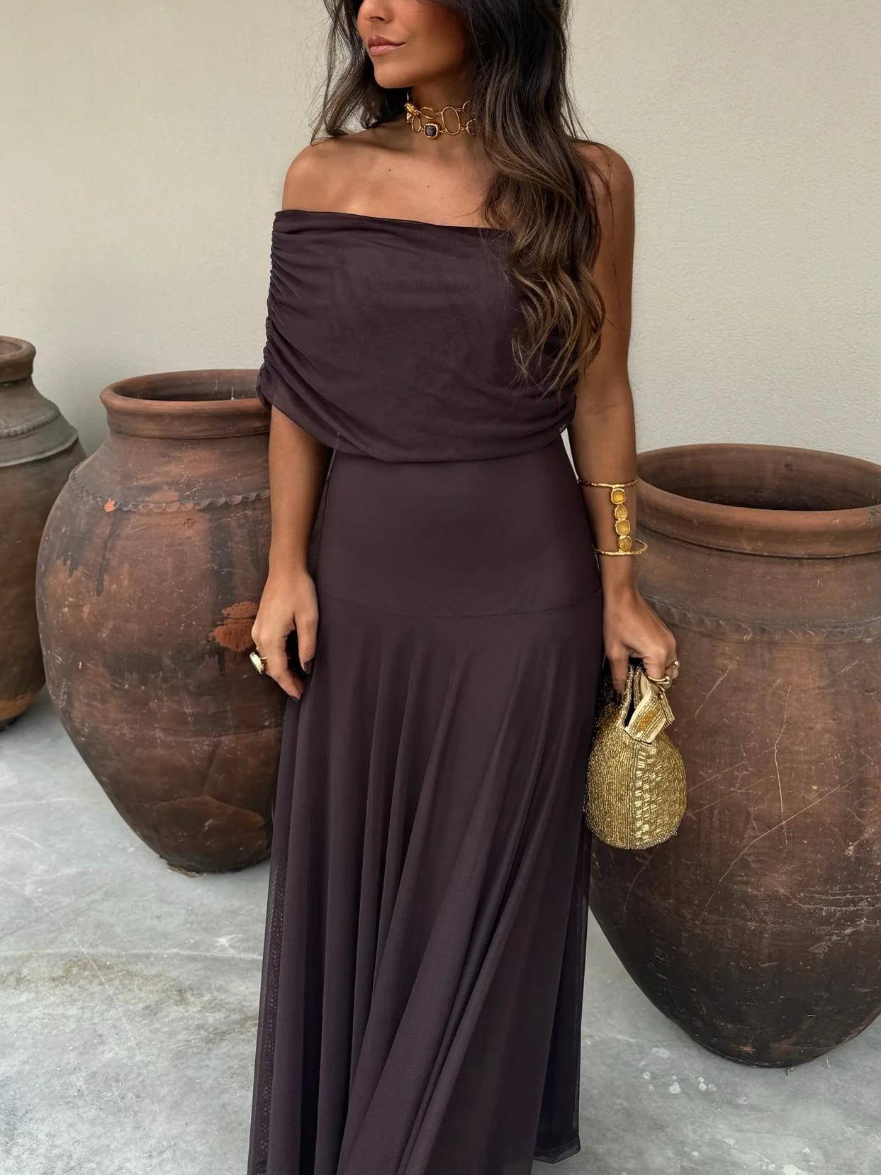 Elegant women's long flowing formal dress featuring a delicate mesh overlay, perfect for weddings and special occasions. 8