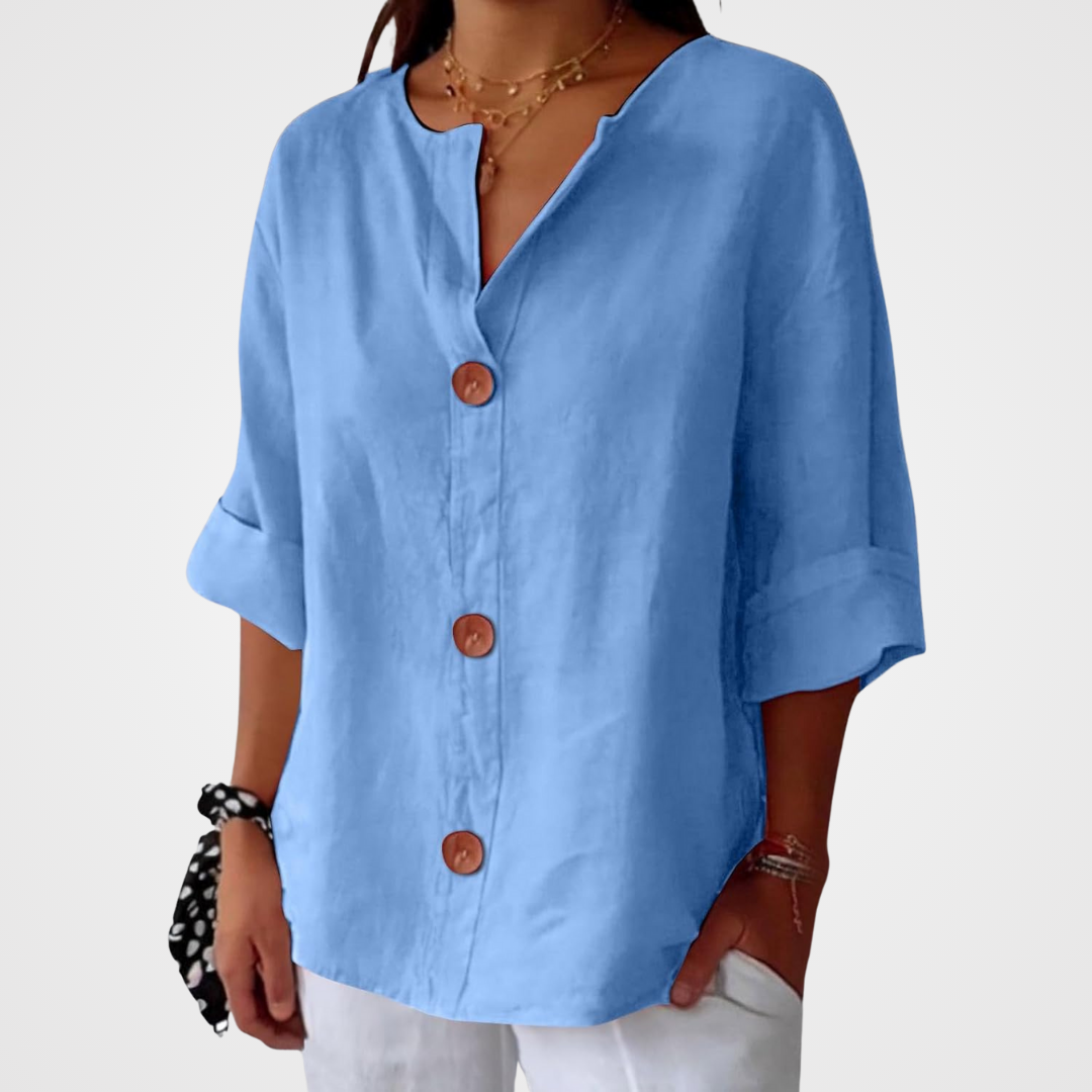Women's loose fit blouse in lightweight summer linen, perfect for casual outings, featuring a relaxed silhouette and breathable fabric for comfort. 1