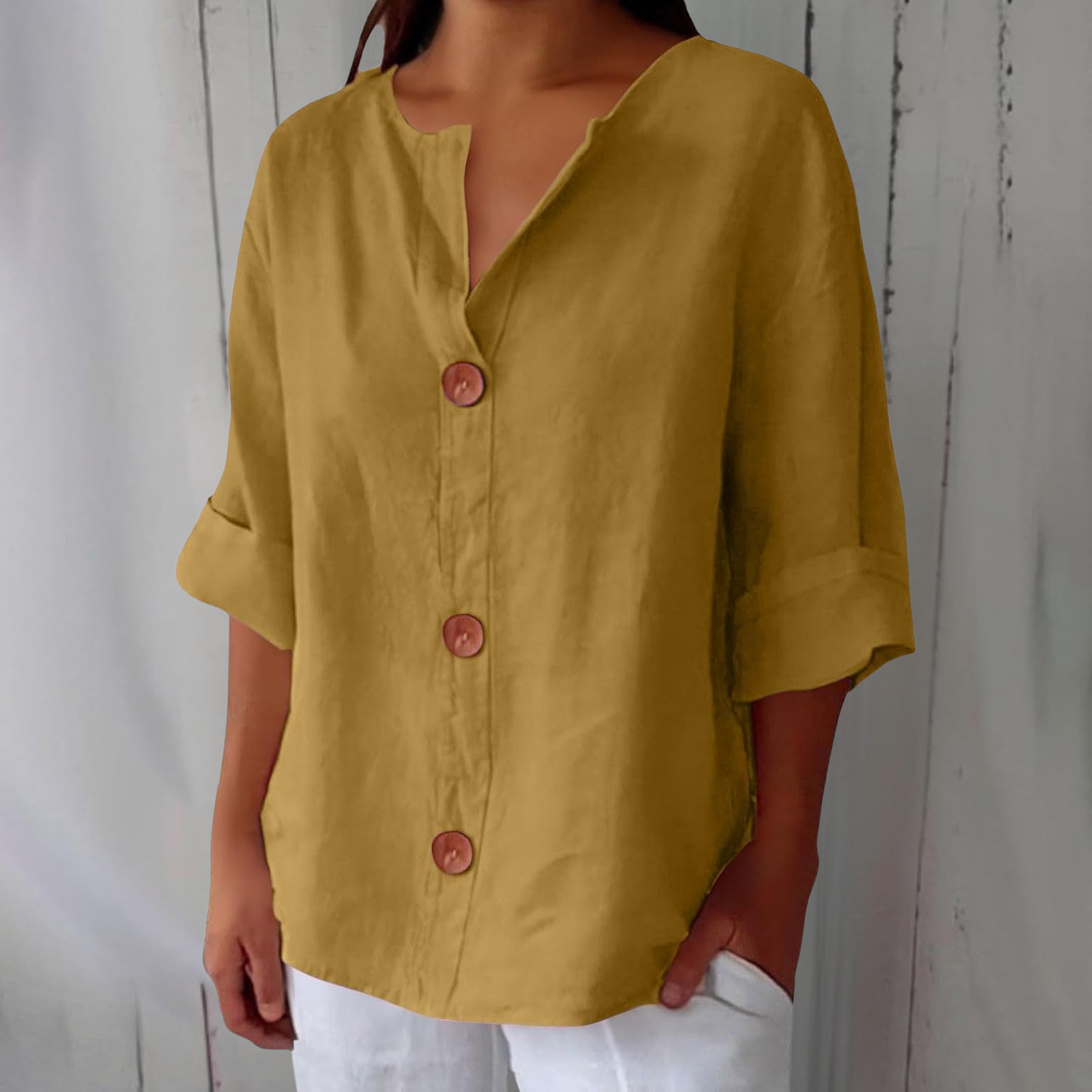 Women's loose fit blouse in lightweight summer linen, perfect for casual outings, featuring a relaxed silhouette and breathable fabric for comfort. 6