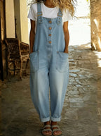 Women's loose fit denim overalls perfect for casual everyday wear, featuring adjustable straps and a relaxed silhouette for comfort and style. 2