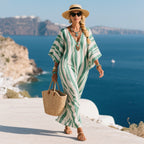 Women's plus size maxi kaftan dress in vibrant colors, perfect for summer occasions, featuring a flowy silhouette and lightweight fabric for comfort and style. 2