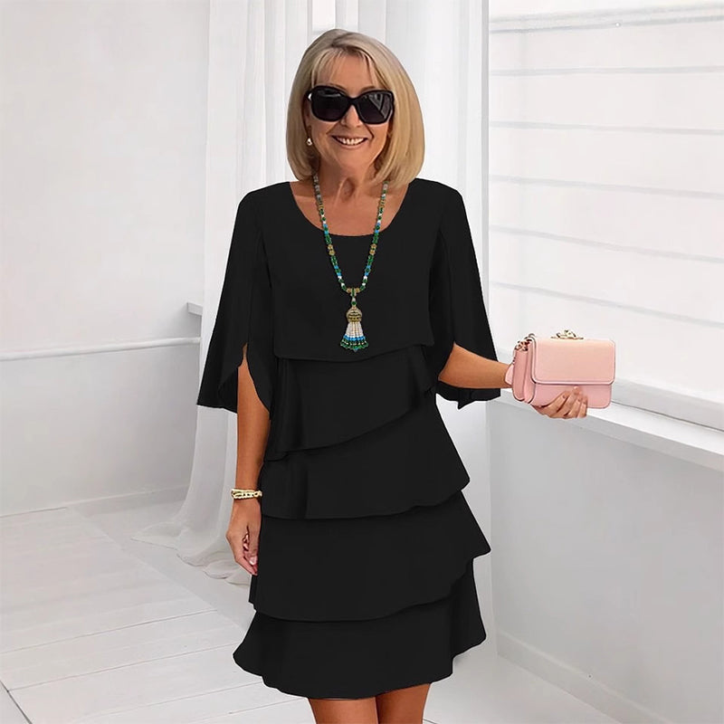 Women's casual summer shift dress featuring stylish puff sleeves, perfect for warm-weather outings and versatile enough for both day and night events. 11