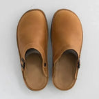Women's regular fit clogs featuring an adjustable buckle, designed for comfort and style in everyday wear. 2