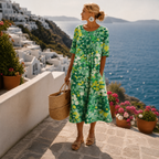 Women's relaxed A-line floral midi dress perfect for summer occasions, featuring a vibrant floral print and comfortable fit. 1