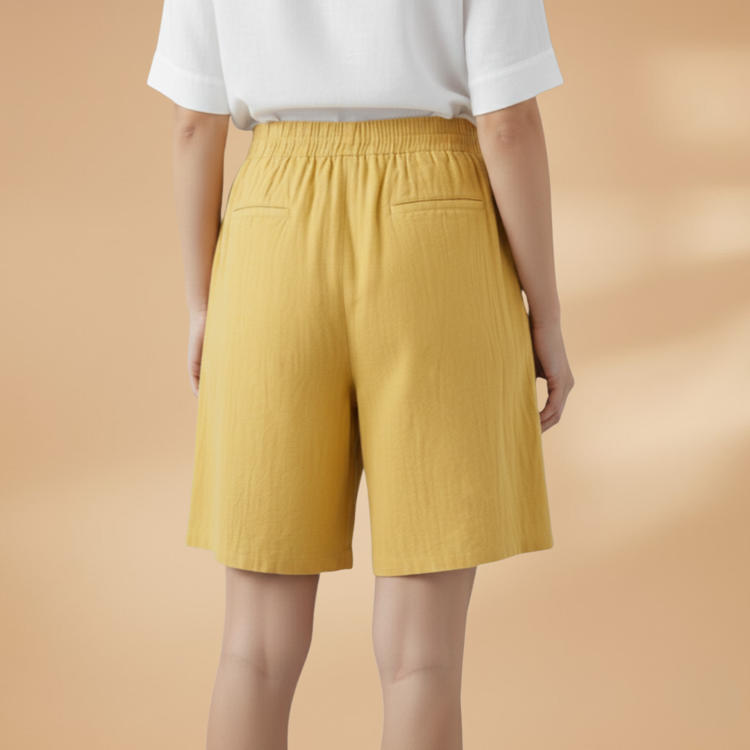 Women's relaxed fit knee-length shorts in a stylish design, perfect for casual outings and summer wear. 5