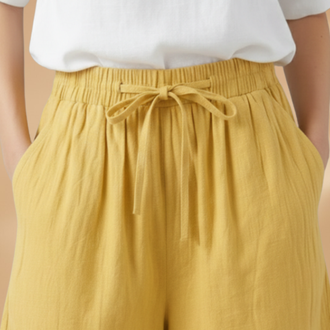 Women's relaxed fit knee-length shorts in a stylish design, perfect for casual outings and summer wear. 6