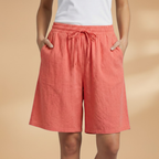 Women's relaxed fit knee-length shorts in a stylish design, perfect for casual outings and summer wear. 8