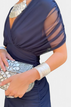 Women's ruched V-neck maxi dress in a vibrant color, perfect for summer formal occasions, featuring elegant flowing fabric and a flattering silhouette. 9