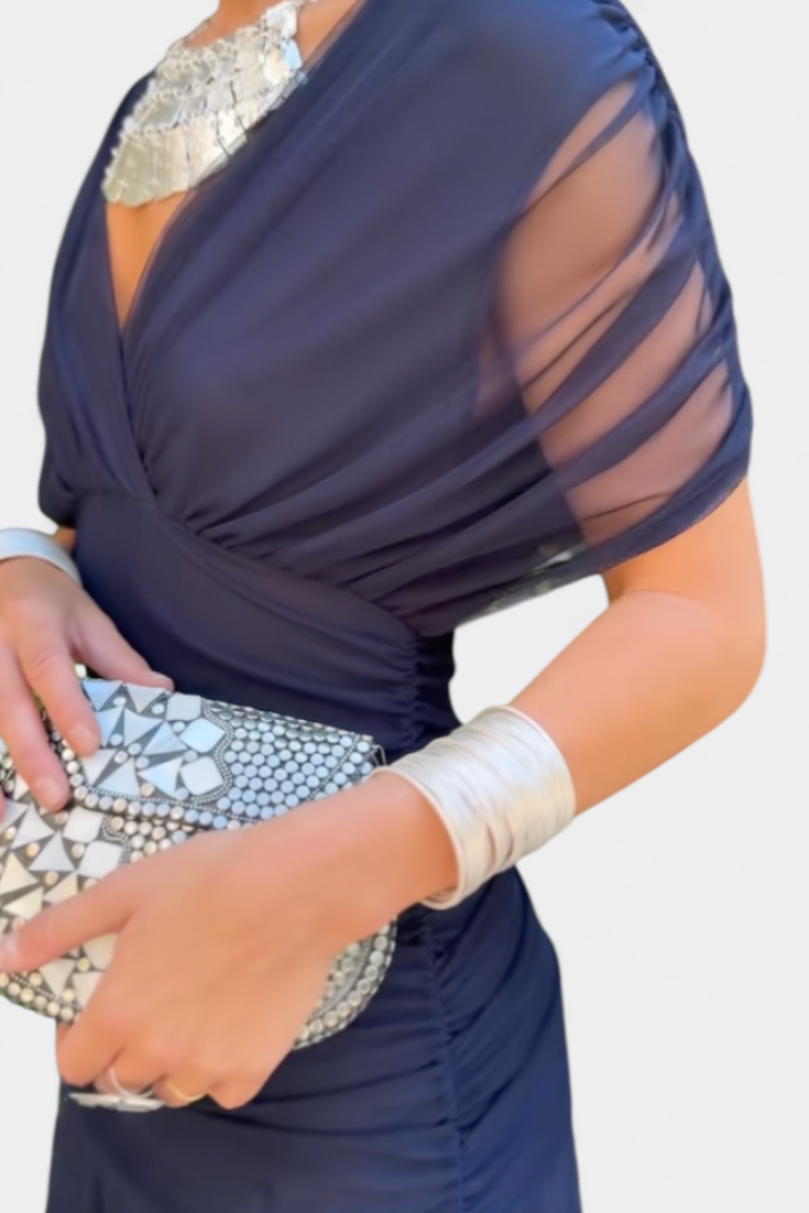 Women's ruched V-neck maxi dress in a vibrant color, perfect for summer formal occasions, featuring elegant flowing fabric and a flattering silhouette. 9