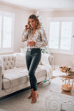Women's sequin puff sleeve top in black, featuring long sleeves and a stylish evening blouse design, perfect for formal events and parties. 2