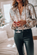 Women's sequin puff sleeve top in black, featuring long sleeves and a stylish evening blouse design, perfect for formal events and parties. 3