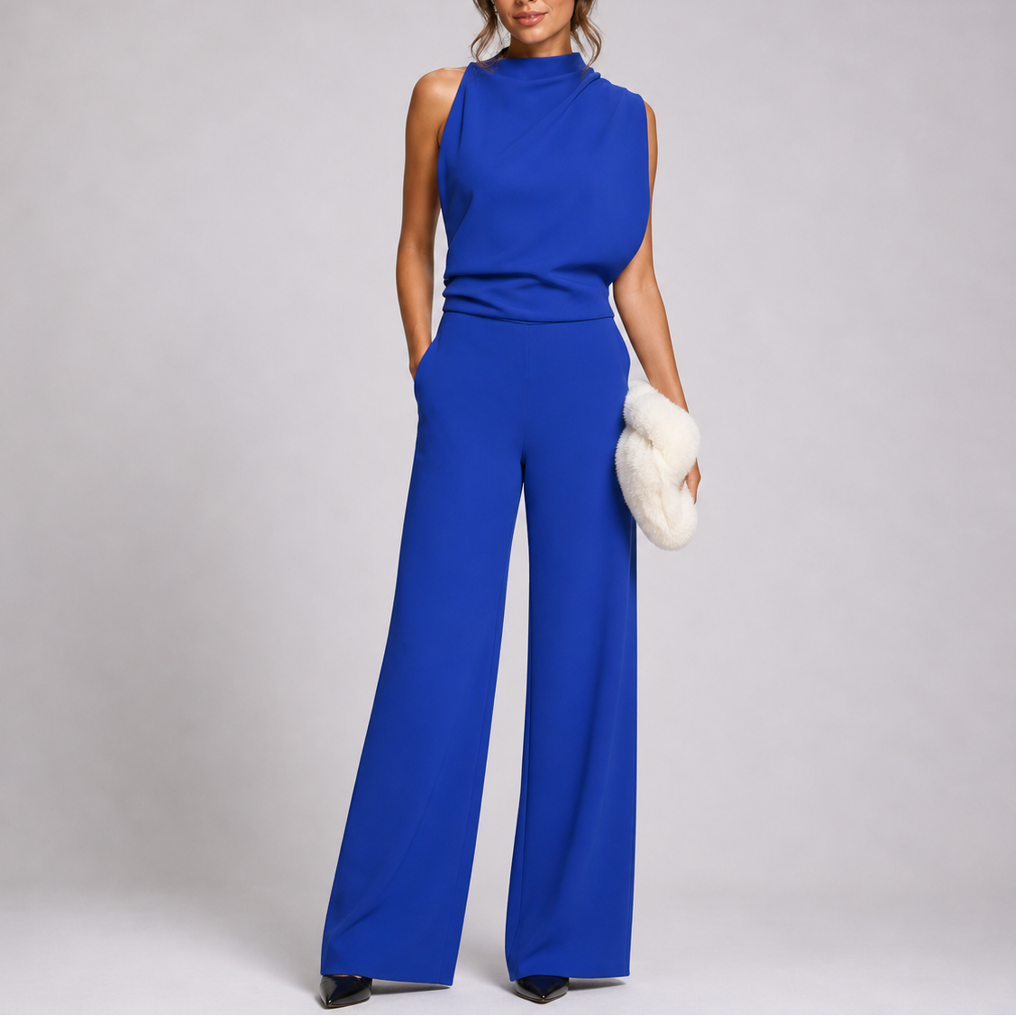 Women's sleeveless wide-leg jumpsuit in a stylish design, perfect for casual wear, featuring a comfortable fit and versatile styling options. 5