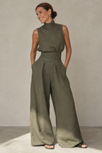 Women's sleeveless wide leg jumpsuit in a stylish design, perfect for casual spring and summer wear, featuring lightweight fabric and a comfortable fit. 0