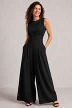 Women's sleeveless wide leg jumpsuit in a stylish design, perfect for casual spring and summer wear, featuring lightweight fabric and a comfortable fit. 6