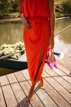 Women's slim fit midi dress featuring a sleeveless design and high neckline, perfect for summer occasions. 8