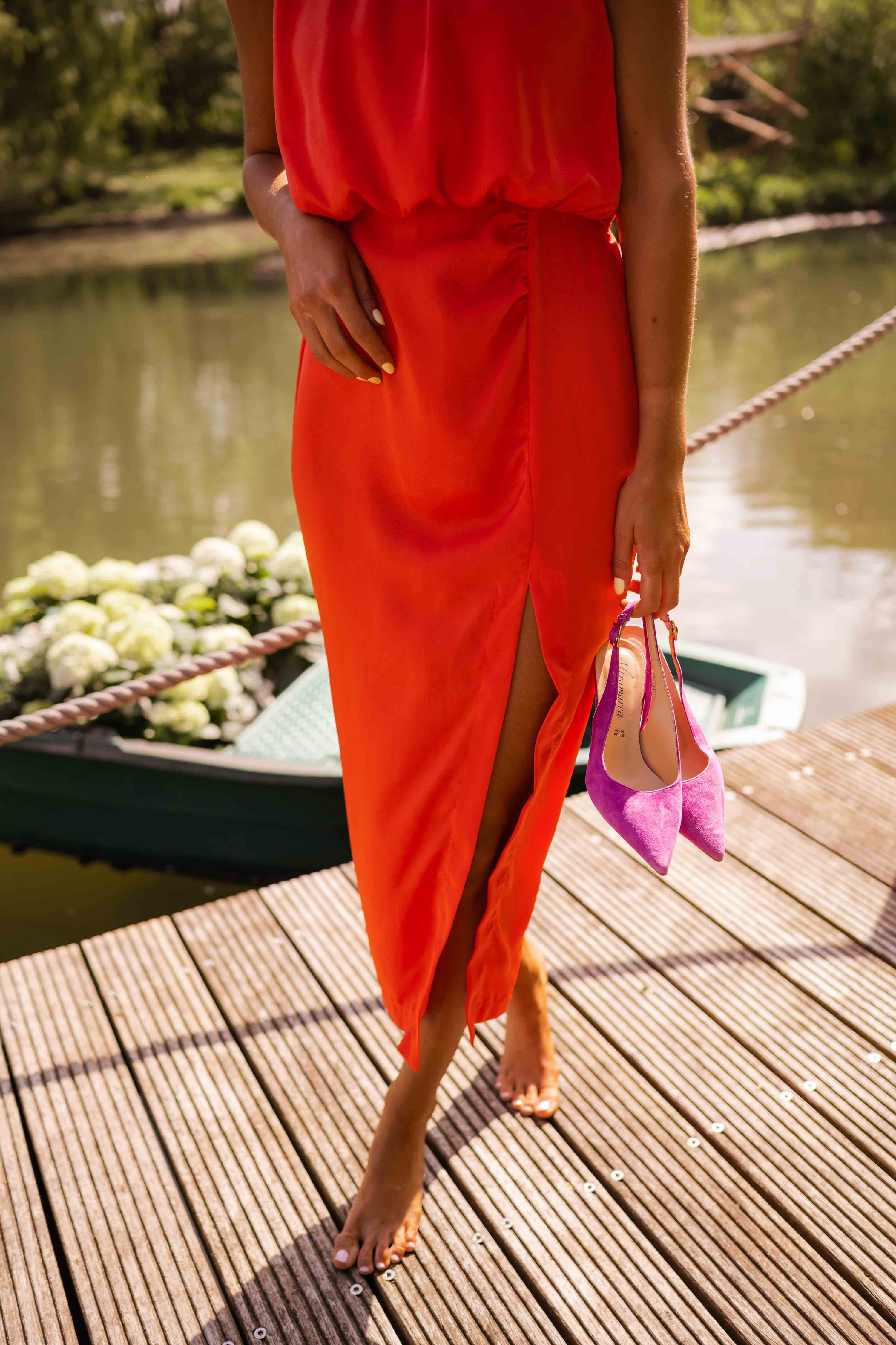 Women's slim fit midi dress featuring a sleeveless design and high neckline, perfect for summer occasions. 8
