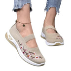 Women's slip-on sneakers featuring a casual comfort design with a vibrant floral pattern, perfect for everyday wear and stylish outings. 11