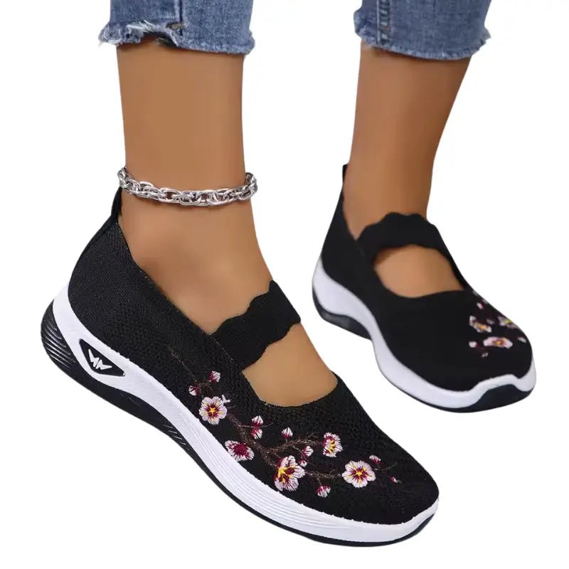 Women's slip-on sneakers featuring a casual comfort design with a vibrant floral pattern, perfect for everyday wear and stylish outings. 13