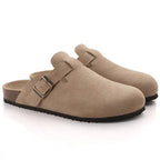 Women's slip-on suede clogs featuring an adjustable buckle, perfect for casual wear and comfortable all-day use. 0