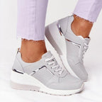 Women's supportive low profile sneakers, perfect for walking, featuring a comfortable design, breathable material, and stylish look for everyday wear. 2